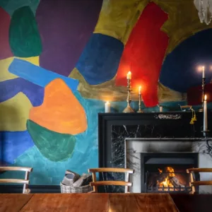 3 title Fred Pollack dining room 2020 ESH dining room fireplace and wall A Baxter copy
